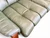 Vintage Tessa Claremont mid-century monaco green two seat sofa seat damage view