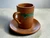 Vintage Ray Cook Pottery espresso mug & saucer green drip-glaze set of 5 1960s staged cup & saucer view