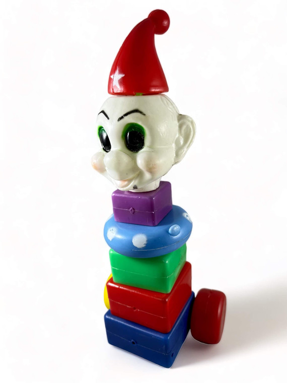 Vintage Christmas pixie elf pull-along toy celluloid plastic 1950's Hong Kong GVC front close up view