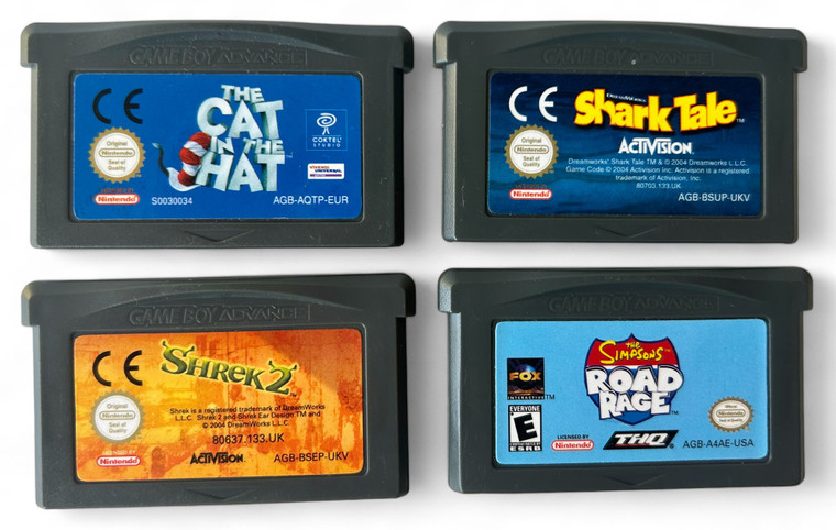 NINTENDO GAMEBOY ADVANCE bulk lot X4 games Cat Hat Simpsons Shark Tale Shrek 2 front view