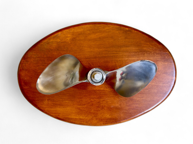Boat propeller mounted on timber wood display maritime three blade
