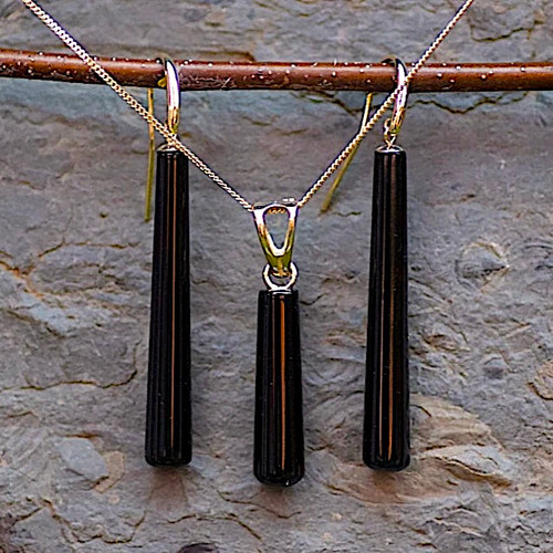 Matching gift set of long cylindrical Whitby Jet drop pendant and earrings on 9ct gold