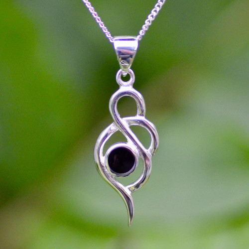 Contemporary sterling silver pendant with round Whitby Jet stone on curb chain