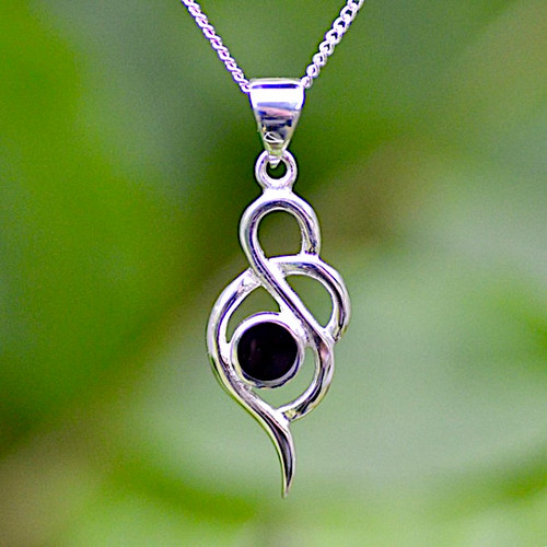 Contemporary sterling silver pendant with round Whitby Jet stone on curb chain