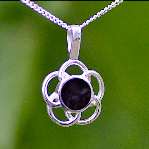 Contemporary sterling silver flower pendant with round Whitby Jet stone