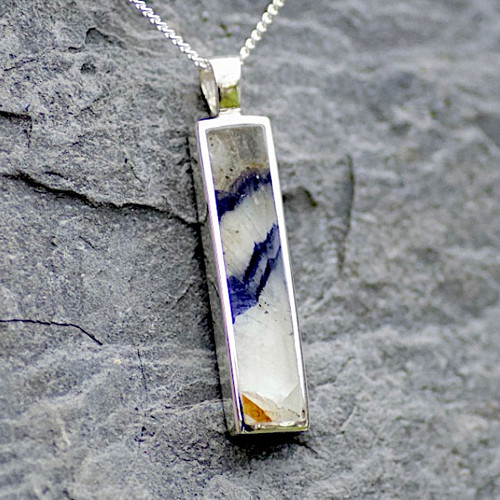 Long slim oblong Derbyshire blue john and sterling silver solid backed pendant