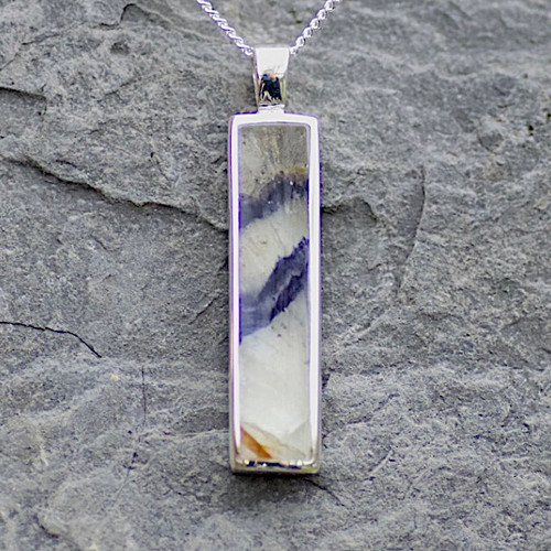 Long slim oblong Derbyshire blue john and sterling silver solid backed pendant