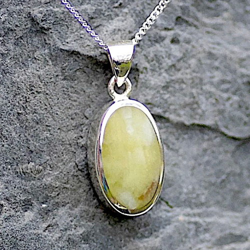Hand crafted oval yellow Connemara Marble sterling silver pendant necklace