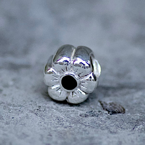 Contemporary 925 silver and black organic gemstone flower charm bead for bangle