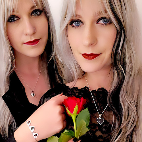 Medium sterling silver heart pendant with shiny black natural gemstone