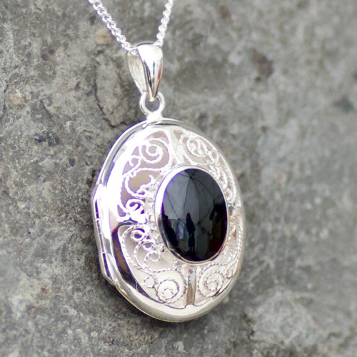 Large oval filigree Whitby Jet and sterling silver locket pendant