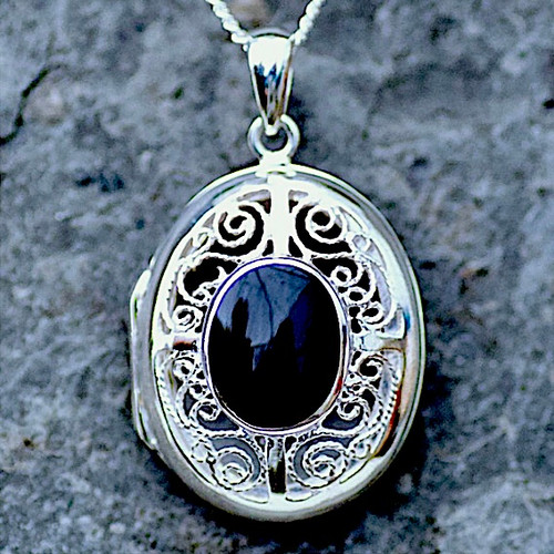 Large oval filigree Whitby Jet and sterling silver locket pendant
