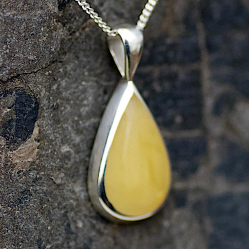 Hand crafted medium yellow amber and 925 silver teardrop necklace