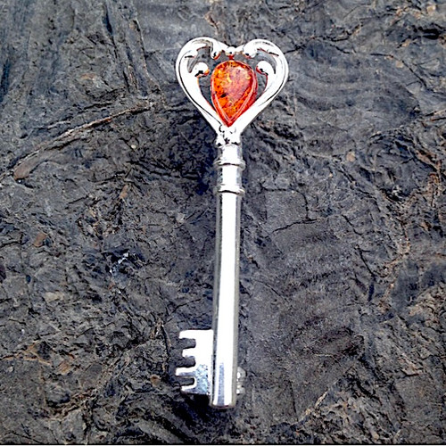 Sterling silver beaded heart key vertical pin brooch with Baltic cognac amber teardrop stone