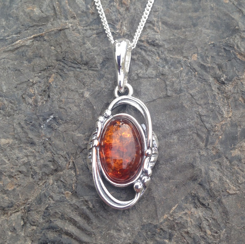 Sterling silver fancy oval cognac amber asymmetrical pendant