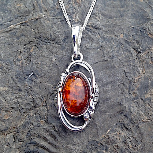 Sterling silver beaded oval Baltic cognac amber asymmetrical pendant necklace