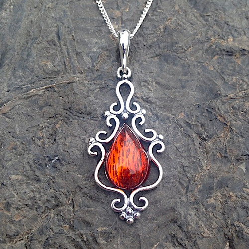 Large fancy sterling silver filigree pendant with Baltic cognac amber teardrop stone