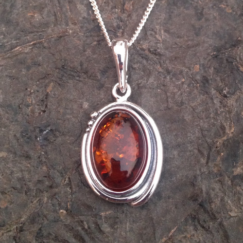 Baltic Fossil Amber Pendant in Sterling Silver Polished Cognac Amber –  AmpearlBeads