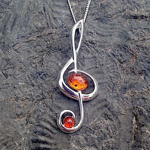 Large sterling silver treble clef pendant necklace with Baltic cognac amber stones