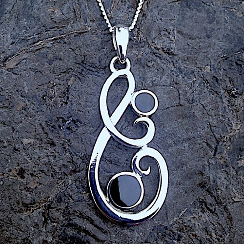 Contemporary sterling silver swirl pendant two hand carved round Whitby Jet stones