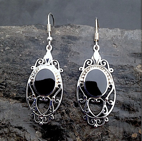 Long sterling silver filigree earrings set with oval Whitby Jet stones