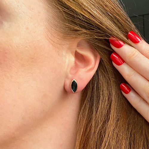 Hand crafted 9ct gold studs with organic shiny black marquise cut gemstone Hand crafted 9ct gold studs with organic shiny black marquise cut gemstone