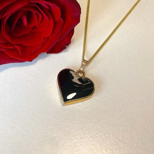 9ct gold love heart necklace with shiny organic black gemstone in gift case