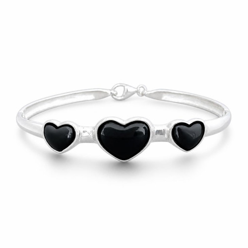 Hand crafted sterling silver bracelet bangle with three Whitby Jet black love hearts