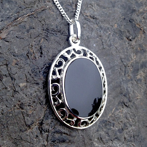 Large oval fancy scroll edge sterling silver Whitby Jet pendant