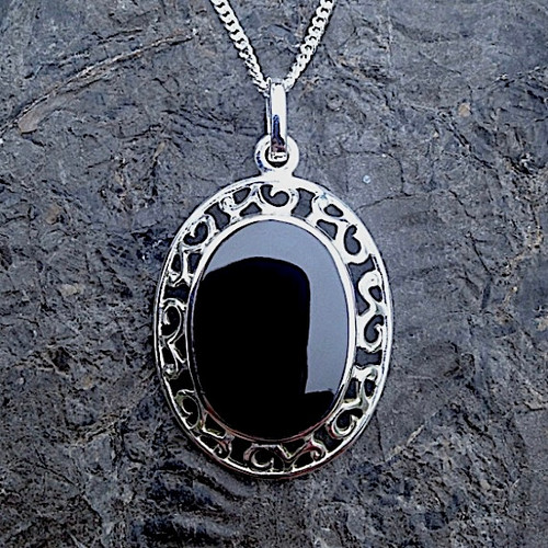 Large oval fancy scroll edge sterling silver Whitby Jet pendant