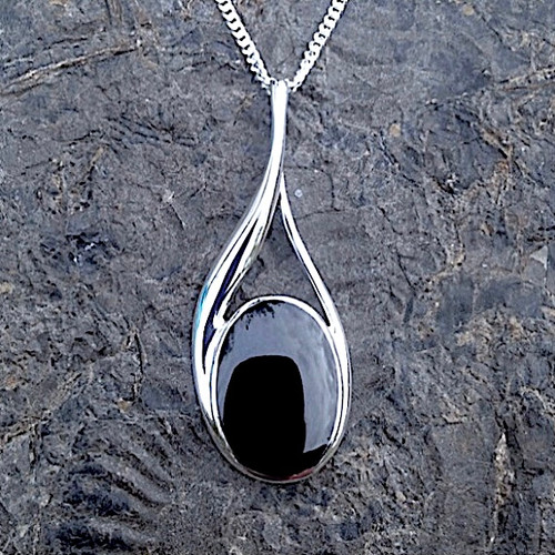 Large sterling silver wishbone shaped pendant with oval Whitby Jet stone