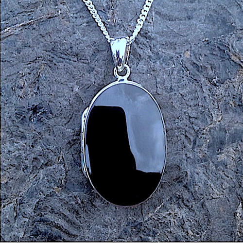 Hand crafted Medium Sterling silver locket pendant with oval Whitby Jet stone