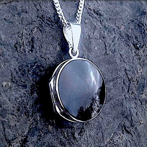 Small sterling silver circular Whitby Jet locket pendant