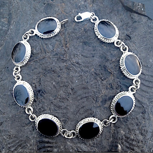 Hand crafted Whitby Jet and sterling silver oval multi stone rope edge bracelet