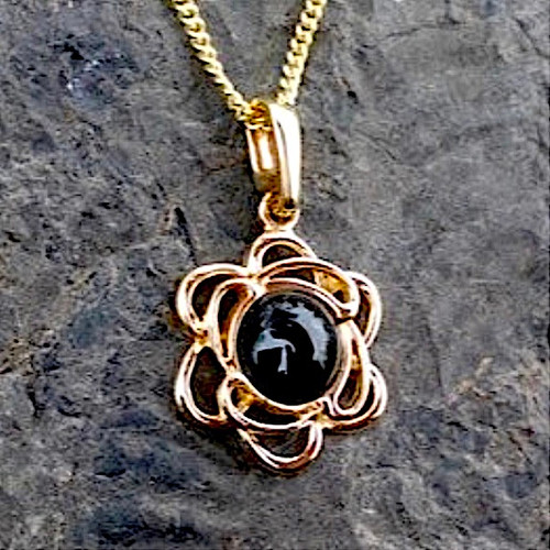 Hand crafted Whitby Jet 9ct gold open flower pendant necklace with round cabochon