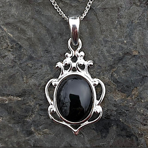 Hand crafted sterling silver Whitby Jet fancy pendant with oval cabochon