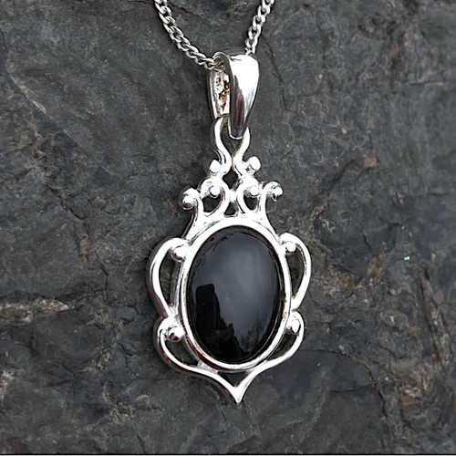 925 silver necklace with intricate detailing and shiny black cabochon in gift box