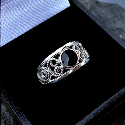 Sterling silver wide filigree ring with organic round shiny black stone
