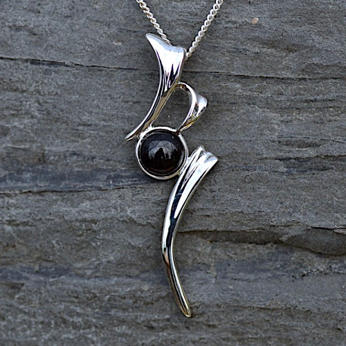 Modern sterling silver Whitby Jet necklace with hand carved round cabochon