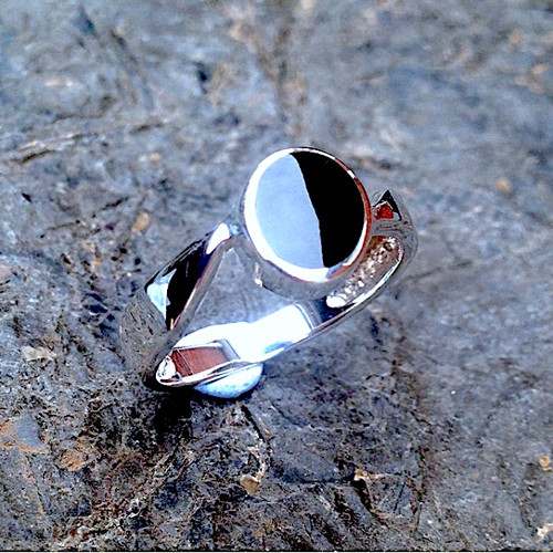 Contemporary Sterling silver ring with offset black oval organic gemstone