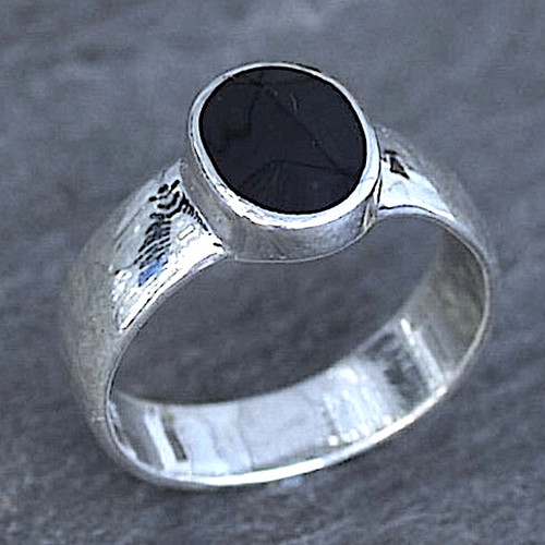Wide sterling silver ring with hand cut oval Whitby Jet stone