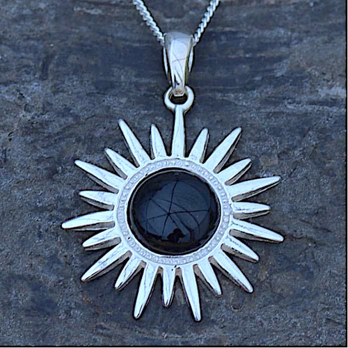 Contemporary sterling silver sun pendant necklace with circular Whitby Jet cabochon