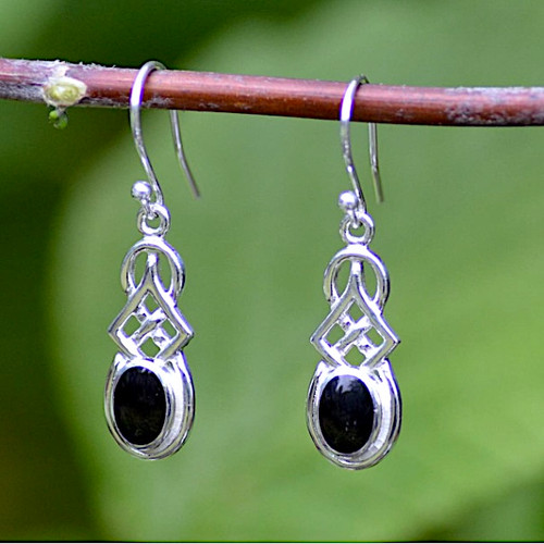 Hand crafted traditional sterling silver Celtic dangly earrings with oval Whitby Jet