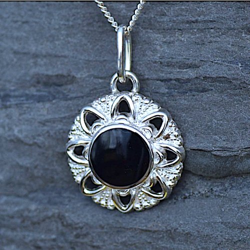 Circular 925 silver ornate floral necklace with hand carved round organic black gemstone