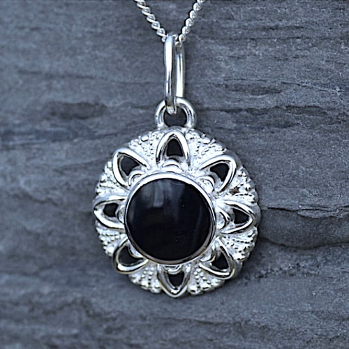 Circular sterling silver floral pendant necklace with hand carved round Whitby Jet