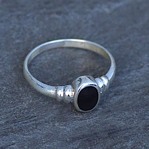 Sterling silver ring with ribbed shoulder and oval Whitby Jet stone