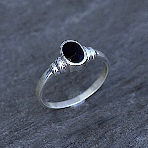 Sterling silver ring with ribbed shoulder and oval Whitby Jet stone