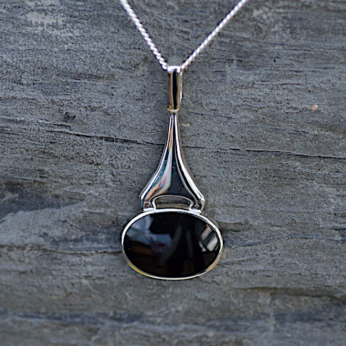 Modern hand crafted 925 silver necklace with oval organic black gemstone