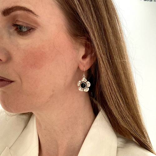 Contemporary black and silver flower dangly earrings