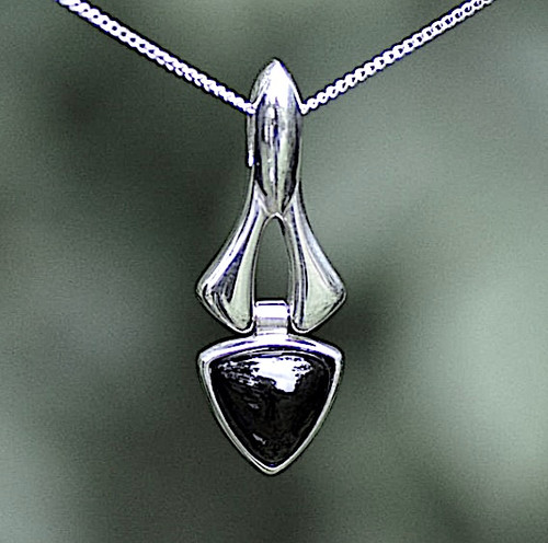 Hand crafted sterling silver pendant necklace with curved triangle Whitby Jet cabochon